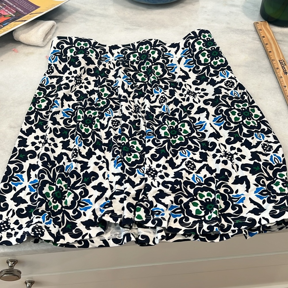 18 inches long, cotton elastic at waist
